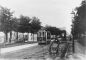 Gävle transports 1. Two trams and a man with a wheelbarrow at Brynäsgatan. 1910. Author: unknown.