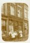 Schiedam family 4. The Leusen family standing in front of their recently opened haberdashery store on Hoogstraat, 1912-1913. Author: unknown.